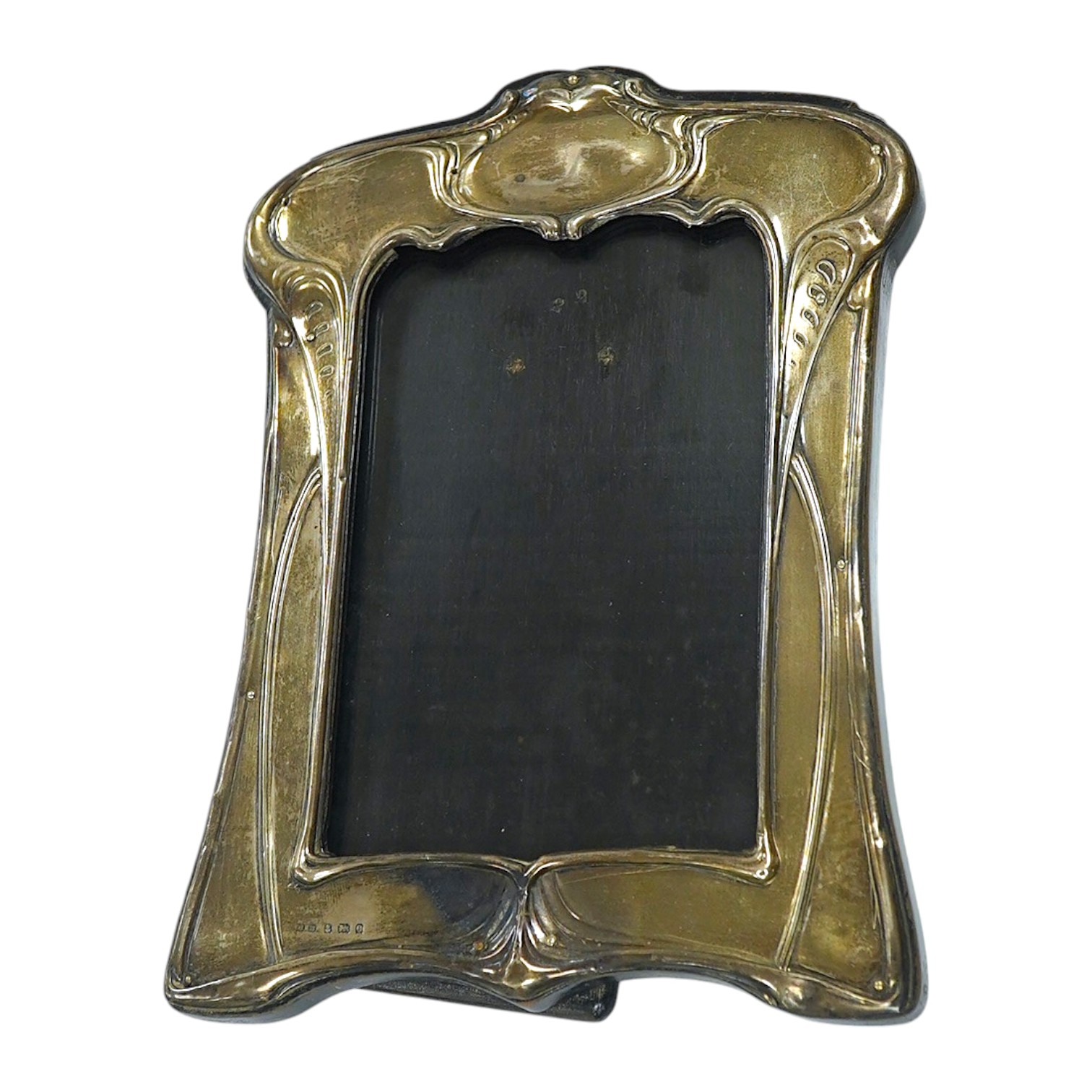 An Edwardian Art Nouveau silver mounted photograph frame, Henry Matthews, Birmingham 1904, 20.6cm. Condition - poor